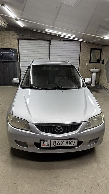 Mazda 323: 2001 г., 1.6 л, Механика, Бензин, Универсал