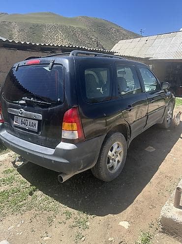 82 беларус трактор: Mazda Tribute: 2002 г., 2 л, Механика, Бензин, Кроссовер — 2