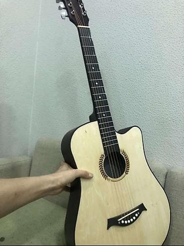 Музыкалык аспаптар: Акустическая гитара с вырезом (cutaway) формата дредноут. Основные — 2