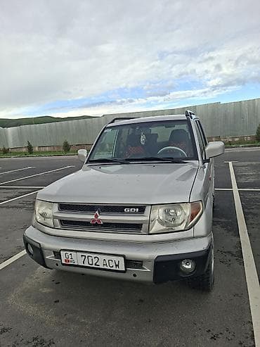 мицубиси голд: Mitsubishi Pajero iO: 2001 г., 2 л, Автомат, Бензин, Внедорожник — 1