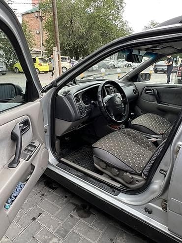 sg 9: Nissan Primera: 1999 г., 1.8 л, Механика, Бензин, Универсал — 9
