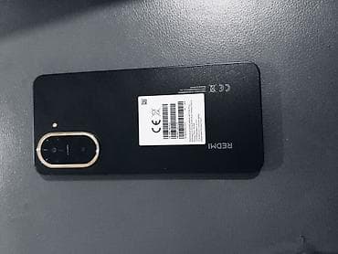 телефон кнопачный: Redmi, Redmi A5, 128 ГБ, цвет - Черный, 2 SIM — 1