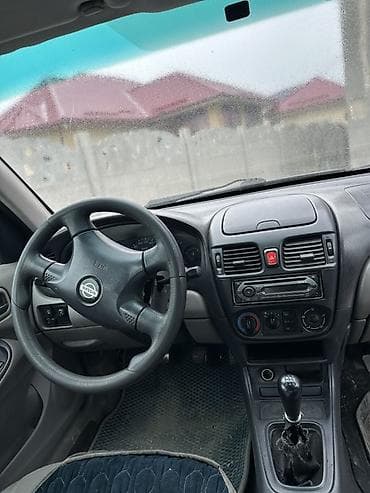 almer: Nissan Almera: 2004 г., Ручные, Бензин, Хэтчбэк — 6