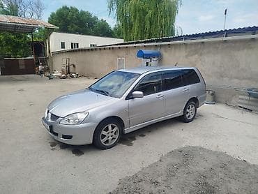 шины колеса: Mitsubishi Lancer: 2003 г., 1.6 л, Механика, Бензин, Универсал — 5