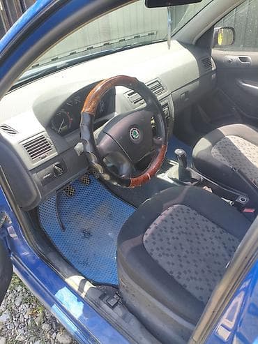 кызыл суу авто: Skoda Fabia: 2006 г., 1.2 л, Кол менен иштөөчү, Бензин, Седан — 4