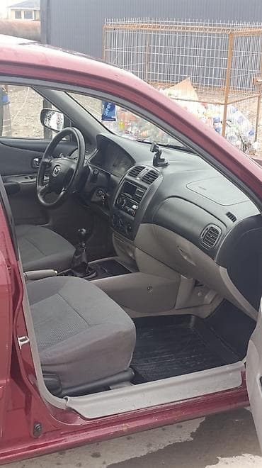 matiz 2009: Mazda 323: 2003 г., 1.3 л, Механика, Бензин, Хэтчбэк — 6