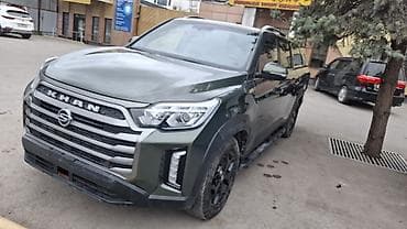 kia bango: SsangYong Khan — полноразмерный пикап цвета хаки с жестким кунгом — 2