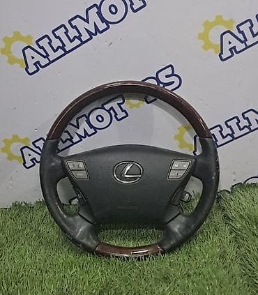 Рулевое колесо Lexus с деревянными вставками и кожаной оплёткой at lalafo.kg Рулевое колесо Lexus с деревянными вставками и кожаной оплёткой