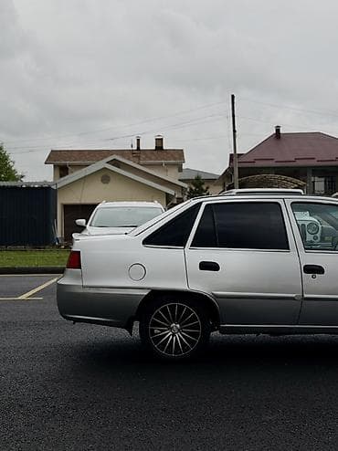 нехсия 2011: Daewoo Nexia: 2009 г., 1.5 л, Механика, Газ, Седан — 7