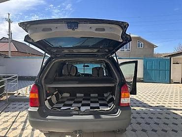 Mazda Tribute: 2001 г., 2 л, Механика, Бензин, Жол тандабас — 9