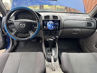 глушитель спортивный: Mazda 323: 2000 г., Хэтчбэк — 10