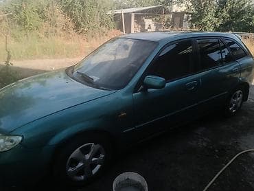 step rf3: Mazda Familia: 2003 г., 1.6 л, Механика, Бензин, Универсал — 2