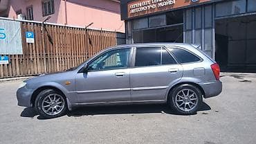 Mazda Familia: 2003 г., 1.6 л, Механика, Бензин, Универсал — 6