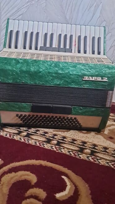 Аккордеон сатылат ундору жакшы тойго чыкса болот