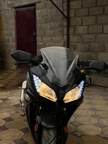 спортбайк цена: Спортивный мотоцикл классического черного цвета с обтекателями — 6