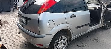 Ford Focus I, 5‑дверный хэтчбек, серебристый цвет. Особенности и