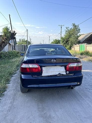 стоп gx: Mazda 626: 2000 г., 2 л, Механика, Бензин, Седан — 4