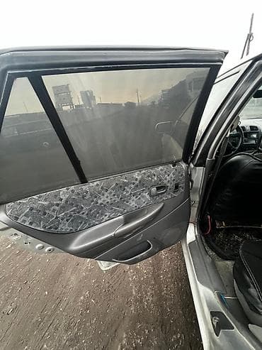 bnw x5: Mazda 323: 1998 г., 1.6 л, Механика, Бензин, Универсал — 9