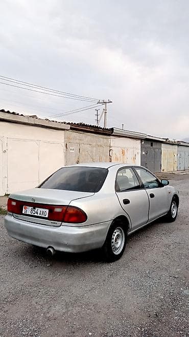 чон арыке: Mazda 323: 1995 г., 1.5 л, Автомат, Бензин — 3