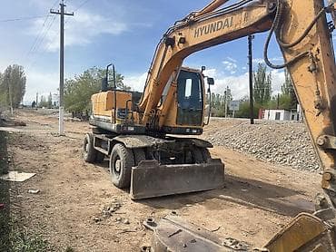 Экскаватор, Hyundai, 2010 г., Колесный