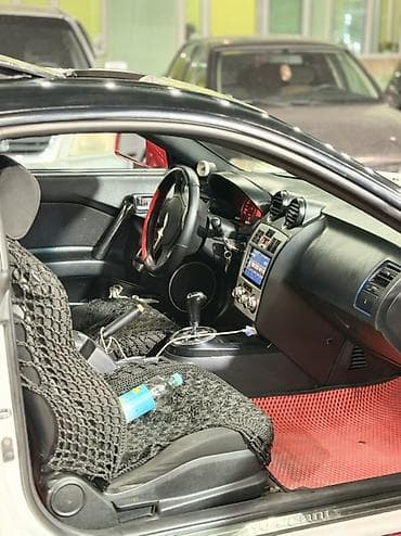 тойота приус с: Hyundai Tuscani: 2002 г., 1.8 л, Автомат, Бензин, Купе — 8