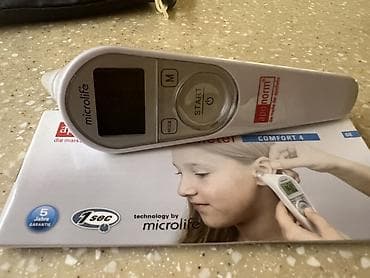 microlife: Инфракрасный ушной термометр Microlife (apo norm), модель Comfort 4 — 1