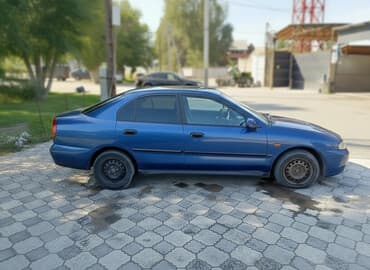 чехол на демио: Mitsubishi Carisma: 1998 г., 1.8 л, Механика, Бензин, Седан — 1