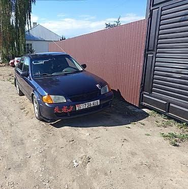 капот мазда: Mazda 323: 2000 г., 1.6 л, Автомат, Бензин, Седан — 6