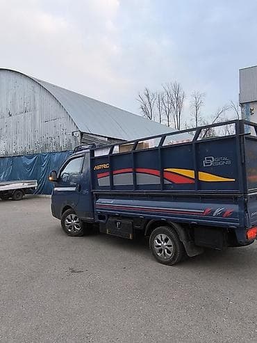 надпись гибрид: Легкий грузовик, Hyundai — 2
