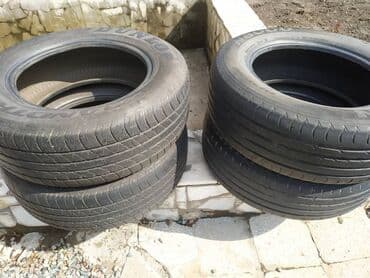 старые покрышки: Продаю две пары летних шин 235/65/R17. Пара Nexen, пара Dunlop — 2