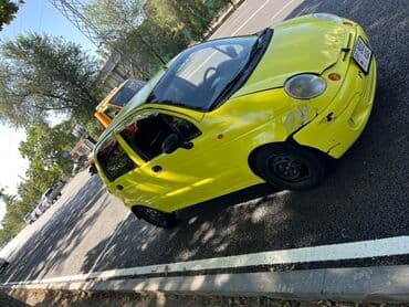 деу матиз 2: Яркий желтый хэтчбек Daewoo Matiz, идеально подходящий для городских — 5