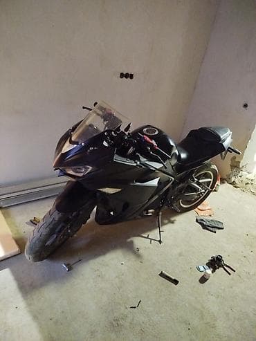 Мотоциклы: Спортивный электромотоцикл в черном матовом окрасе. Особенности: - — 4