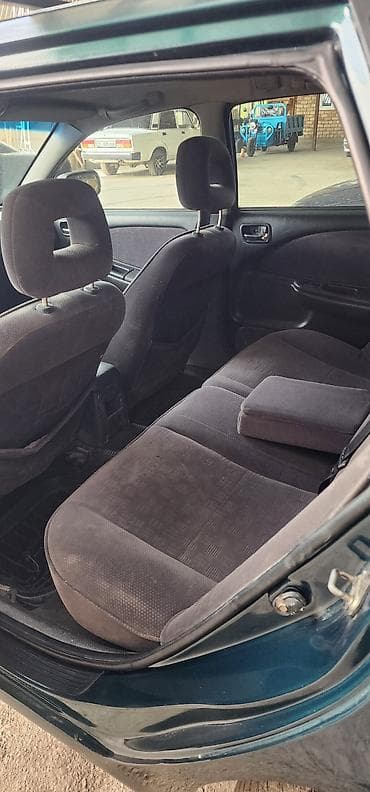 семейный авто: Toyota Avensis: 2000 г., 1.8 л, Механика, Бензин, Универсал — 5
