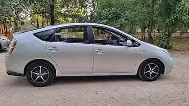 byd e7: Toyota Prius: 2006 г., 1.5 л, Автомат, Гибрид, Хэтчбэк — 3