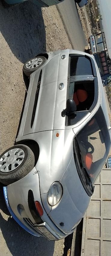 салон машина: Daewoo Matiz: 2000 г., Механика, Хэтчбэк — 4