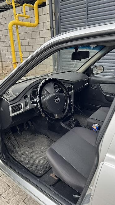 Унаа: Daewoo Nexia: 2010 г., 1.6 л, Кол менен иштөөчү, Бензин, Седан — 9