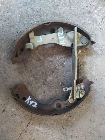 тормозные колодки nibk: Nissan March K12 колодка ручника, Ниссан Марч К12 колодка ручника — 1
