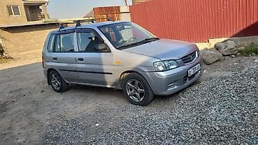 Унаа: Mazda Demio: 2002 г., 1.3 л, Кол менен иштөөчү, Бензин, Хетчбек — 3