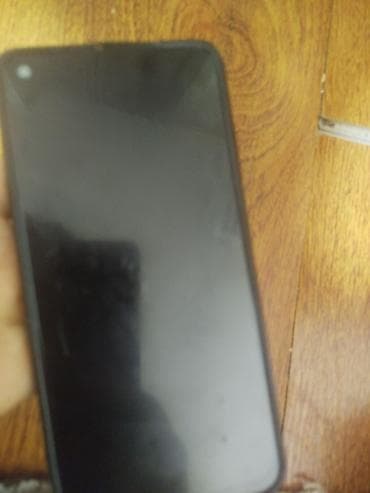 web camera: Смартфон с задней крышкой черного цвета и сканером отпечатка пальца на — 2