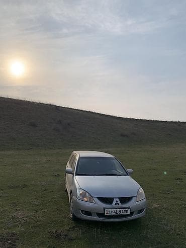 mitsubishi challenger: Mitsubishi Lancer: 2004 г., 1.6 л, Автомат, Бензин, Универсал — 2