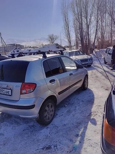 спартивные машины: Hyundai Getz, 5‑дверный хэтчбек, серебристый цвет. Кузов и экстерьер — 2