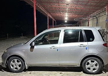 гов 2: Mazda Demio: 2004 г., 1.3 л, Автомат, Бензин, Хэтчбэк — 7