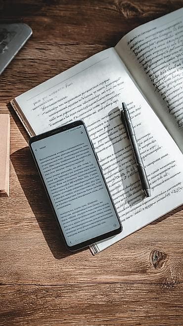 Техника и электроника: Смартфон с экраном около 6 дюймов, тонкими рамками и фронтальной — 1
