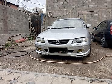 8: Mazda 626: 2001 г., 1.8 л, Механика, Бензин, Седан — 1