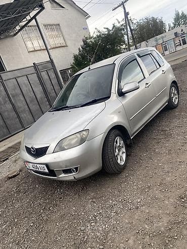 Mazda Demio: 2004 г., 1.3 л, Автомат, Бензин, Хэтчбэк