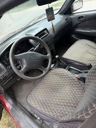коврик: Toyota Corolla: 1999 г., 1.6 л, Механика, Бензин, Седан — 2