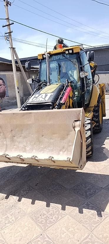 caterpillar: Экскаватор, Caterpillar, Колесный — 1