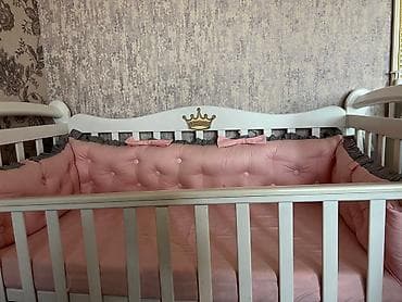 Детская кровать со вставным ящиком для детских вещей. (Качается)