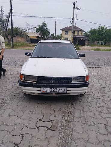 zero x neo: Mazda 323: 1990 г., Механика, Бензин, Седан — 3