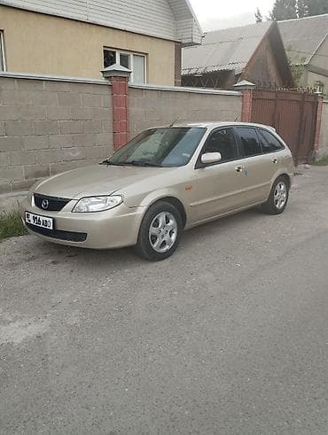 e2 byd: Mazda 323: 2002 г., 1.6 л, Механика, Бензин, Хэтчбэк — 1